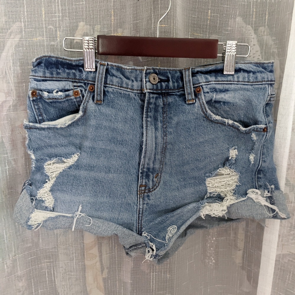 Mid wash distressed denim shorts by Abercrombie & Fitch